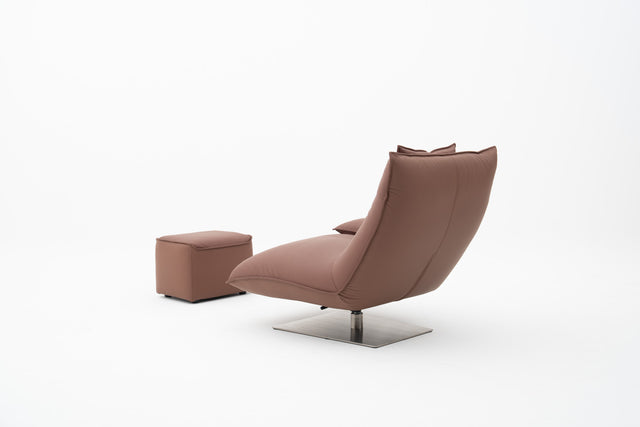 Brown lounge chair with padded headrest, armrest & matching ottoman