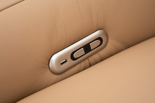 3-Seater brown leather sofa with dual power recliners, adjustable headrests, built-in USB port, & Bluetooth audio feature