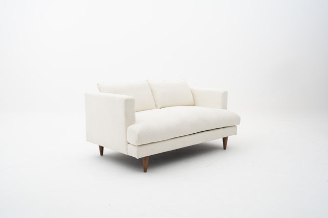 2-Seater white fabric sofa with wooden legs
